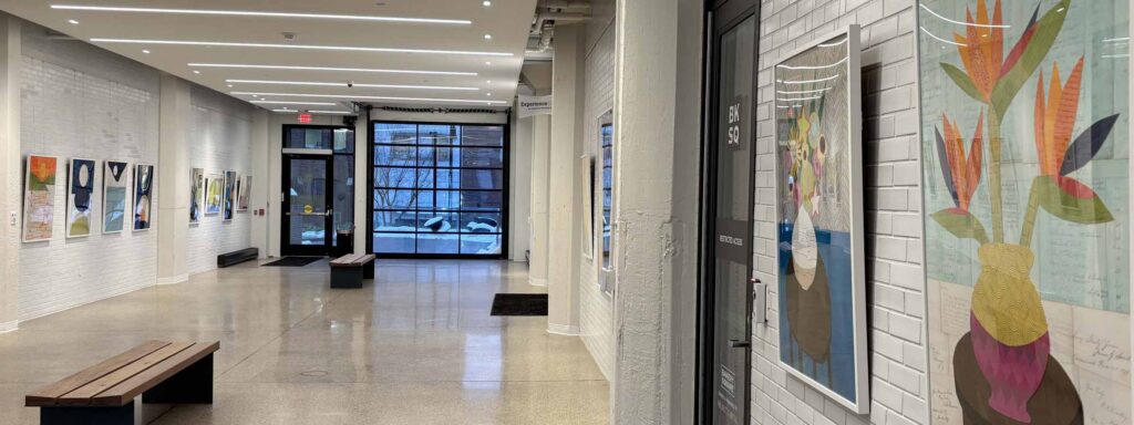 A long gallery view of Emily Krill's solo show at The Portal in Bakery Square