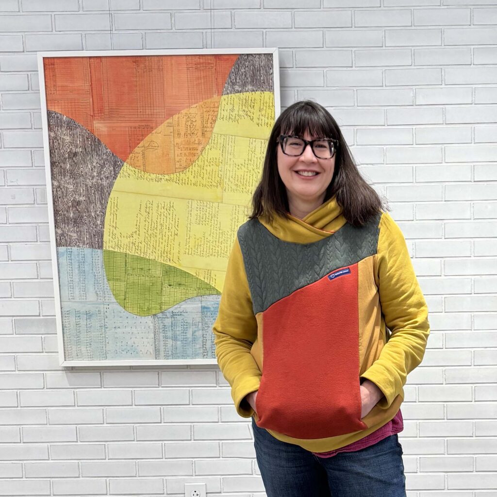 Emily Krill in colorful sweater, abstract collage in the background.