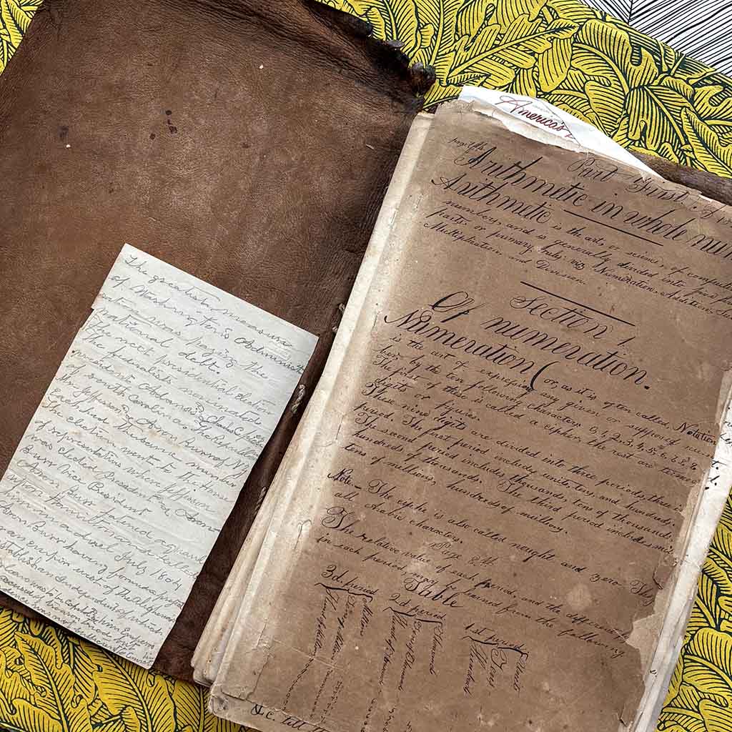a 1800s Workman's Cypher against a bright yellow background