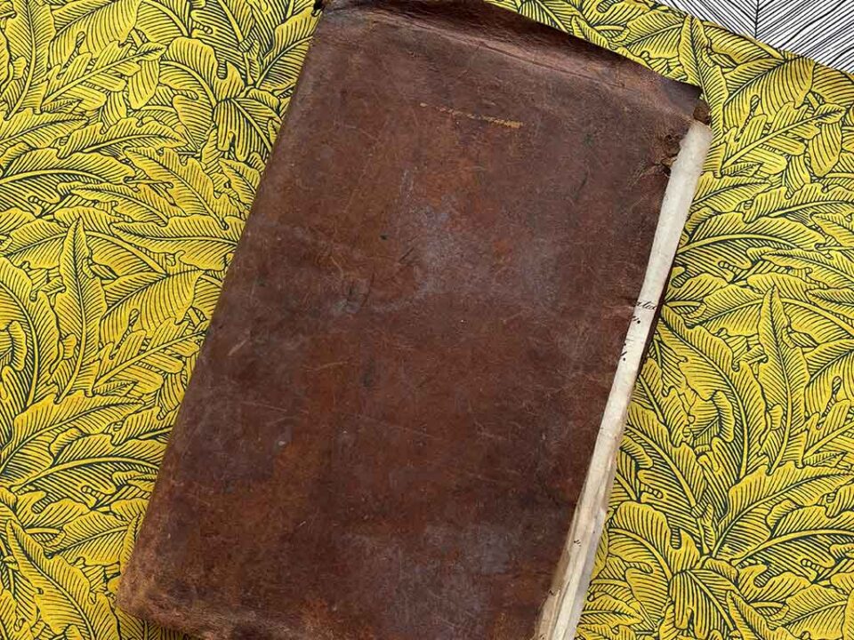 a 1800s Workman's Cypher against a bright yellow background