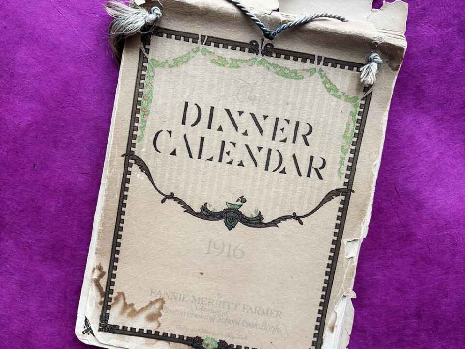 a 1916 Fannie Farmer Dinner Calendar against a pink background