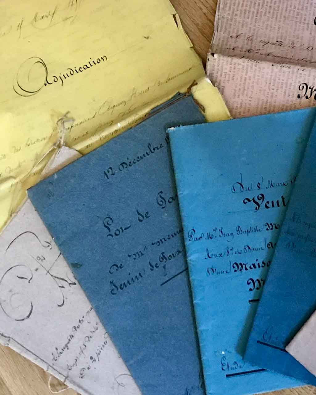 a group of colorful 1870s French Notorial Folios