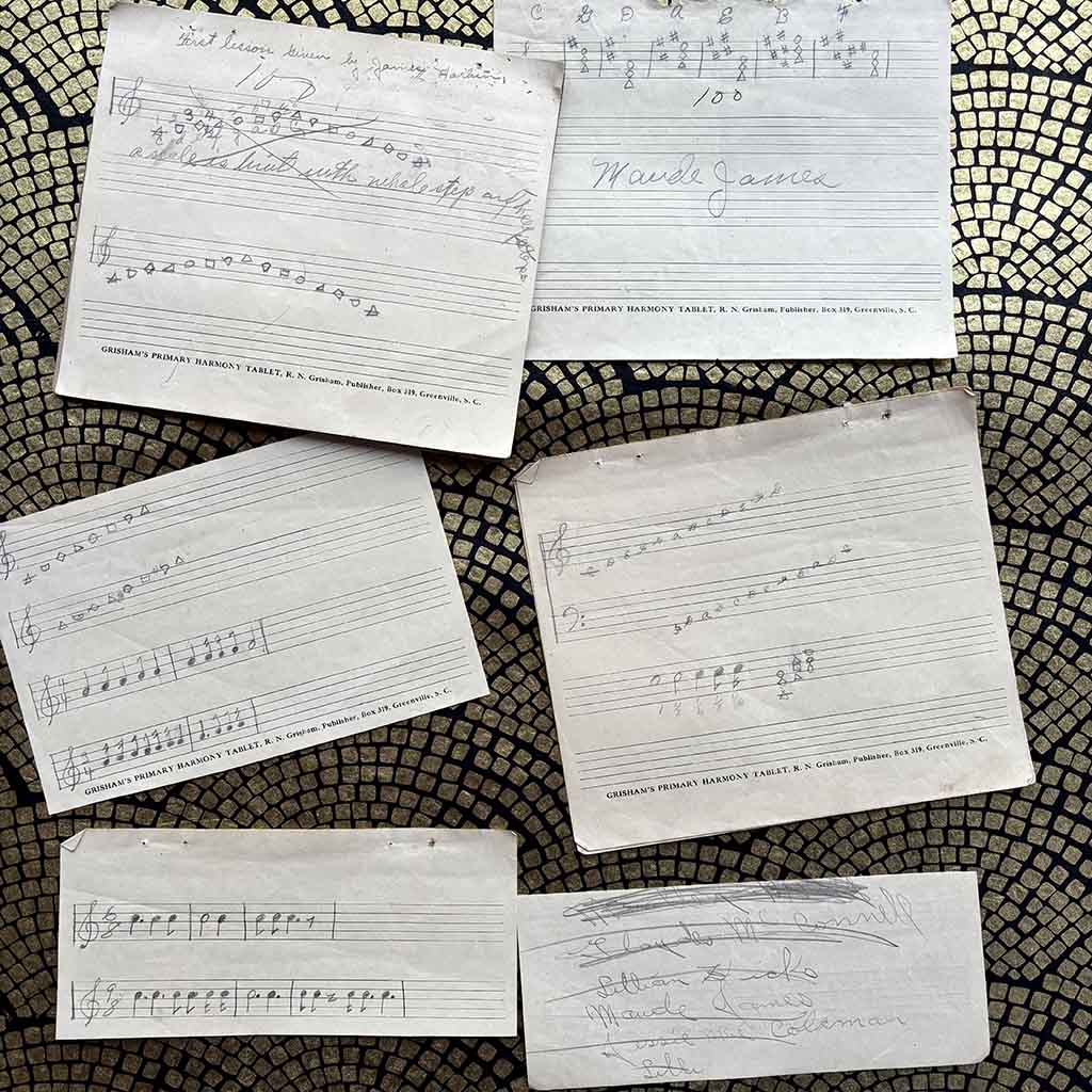 sheets of early-20th-century musical notation