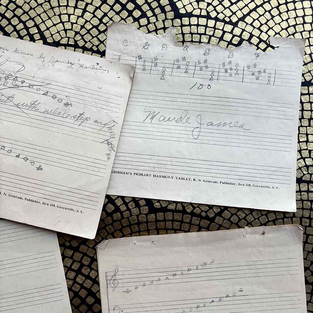 sheets of early-20th-century musical notation