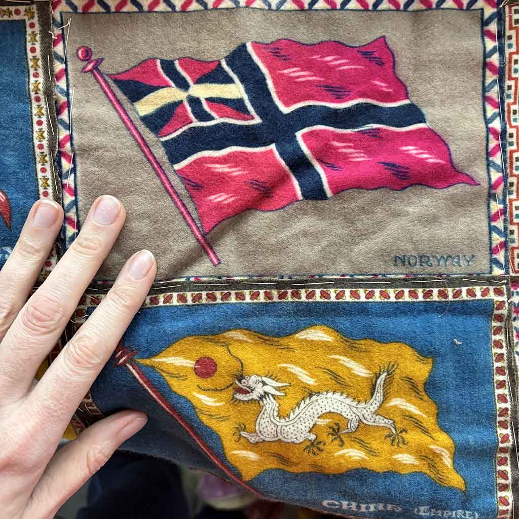 detail of a Pre-WW1 Tobacco Flannel Quilt