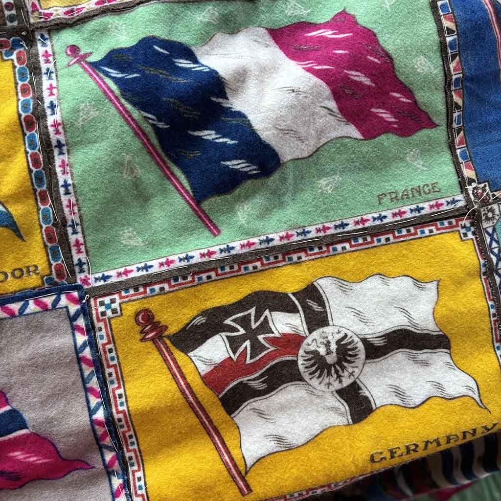 detail of a Pre-WW1 Tobacco Flannel Quilt