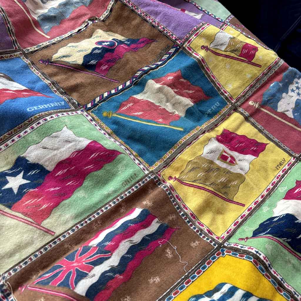 detail of a Pre-WW1 Tobacco Flannel Quilt